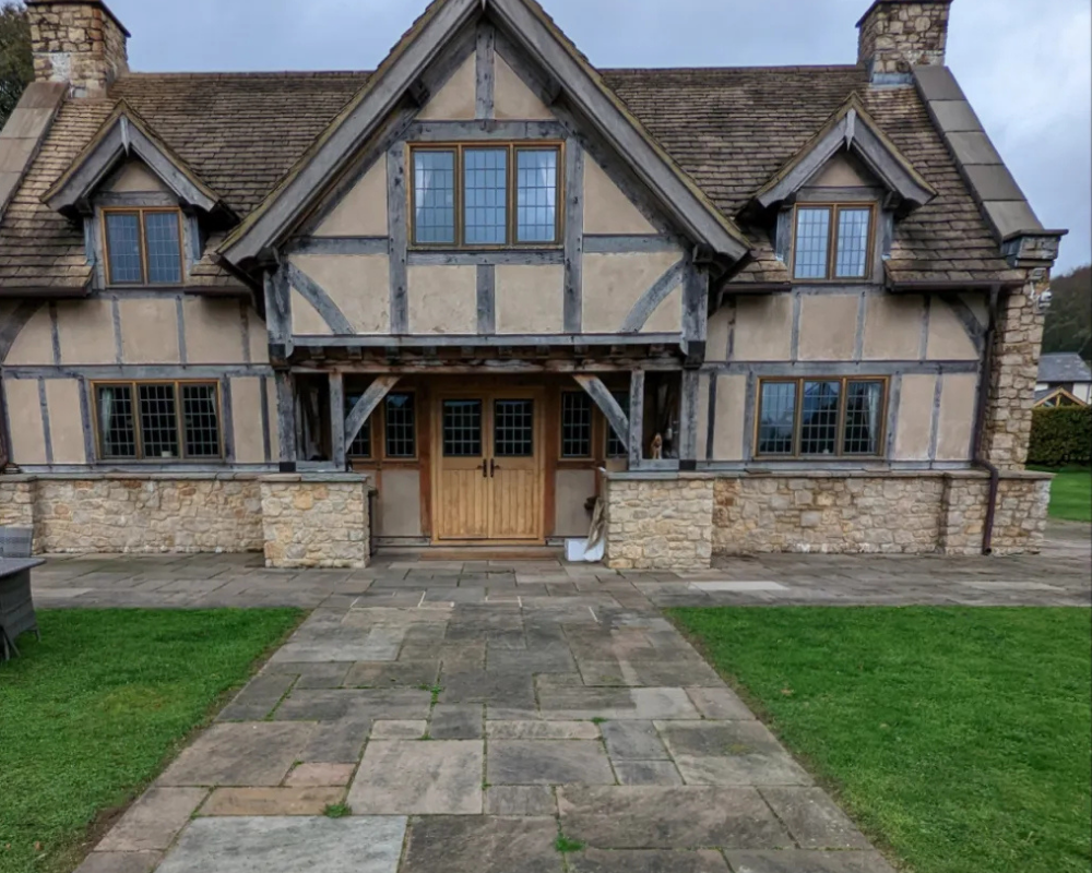Natural stone pathway with heavy dirt, algae and weathering before SmartGuard cleaning.
